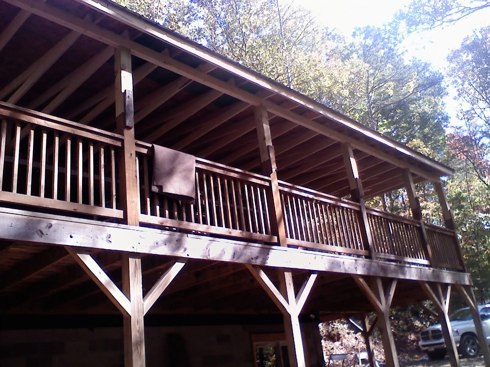 Timber framing under a new elevated porch and deck — Roof Leak Repair in East Leroy by Roofing Brothers